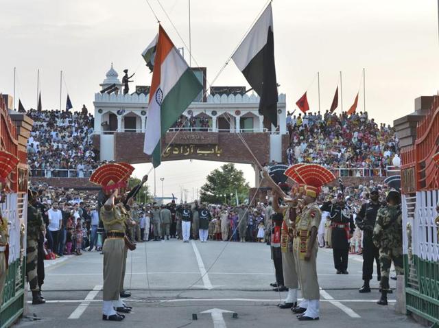 In this July 21, 2015 file photo, Indian and Pakistani flags are lowered during a daily retreat ceremony at the India-Pakistan joint border check post of Attari-Wagah near Amritsar. (AP) In this July 21, 2015 file photo, Indian and Pakistani flags are lowered during a daily retreat ceremony at the India-Pakistan joint border check post of Attari-Wagah near Amritsar. (AP)