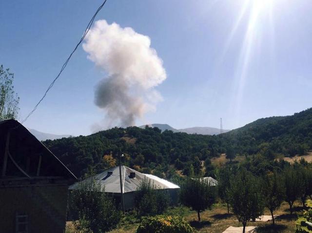 Smokes rise after Kurdish militants detonated a car bomb outside a military station in Semdinli near the border with Iraq. (AP) Smokes rise after Kurdish militants detonated a car bomb outside a military station in Semdinli near the border with Iraq. (AP)