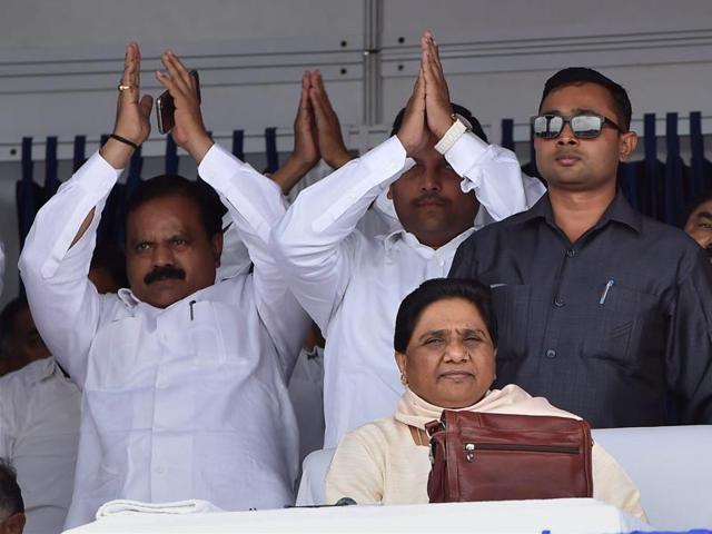 BSP supremo Mayawati with party workers at a function to commemorate the tenth death anniversary of the party founder Kanshiram in Lucknow on Sunday. (PTI Photo) BSP supremo Mayawati with party workers at a function to commemorate the tenth death anniversary of the party founder Kanshiram in Lucknow on Sunday. (PTI Photo)