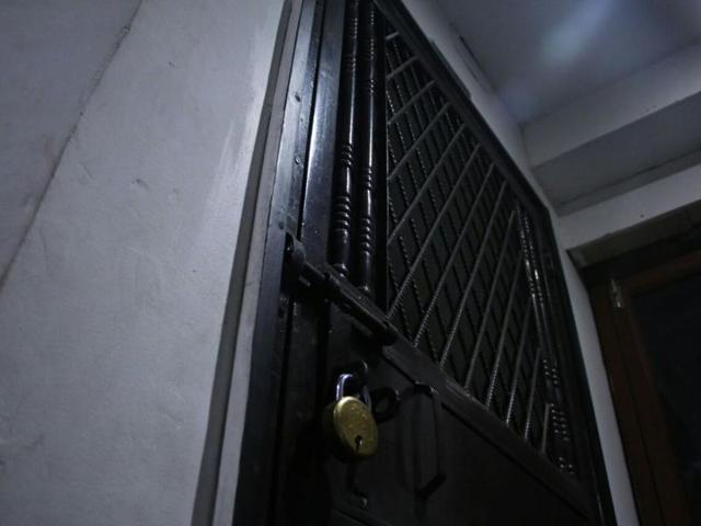 The entrance to Dr Sarkar’s house in Marvel apartments, Sector 61, Noida.(HT)