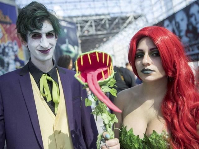 Michael Blaze, left, as the Joker and Kira Scarlett as Poison Ivy pose for a photo during Comic Con, Friday in New York. (AP) Michael Blaze, left, as the Joker and Kira Scarlett as Poison Ivy pose for a photo during Comic Con, Friday in New York. (AP)
