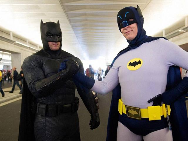 Attendees dressed as different versions of Batman (Ben Affleck’s and Adam West’s) walk the floor of New York Comic Con at the Javits Center. (AP) Attendees dressed as different versions of Batman (Ben Affleck’s and Adam West’s) walk the floor of New York Comic Con at the Javits Center. (AP)