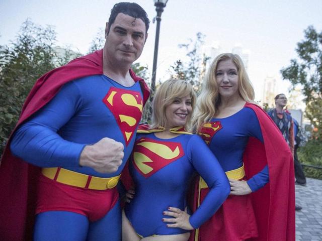 Superman fans Michael Byrnes, left, Frances Tirado, centre, and Amy Byrnes pose for a photo on their way to Comic Con in New York. Comic Con runs through October 9. (AP) Superman fans Michael Byrnes, left, Frances Tirado, centre, and Amy Byrnes pose for a photo on their way to Comic Con in New York. Comic Con runs through October 9. (AP)