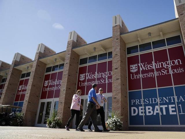 People walk by the debate site ahead of the second presidential debate at Washington University, in St. Louis. (AP Photo) People walk by the debate site ahead of the second presidential debate at Washington University, in St. Louis. (AP Photo)