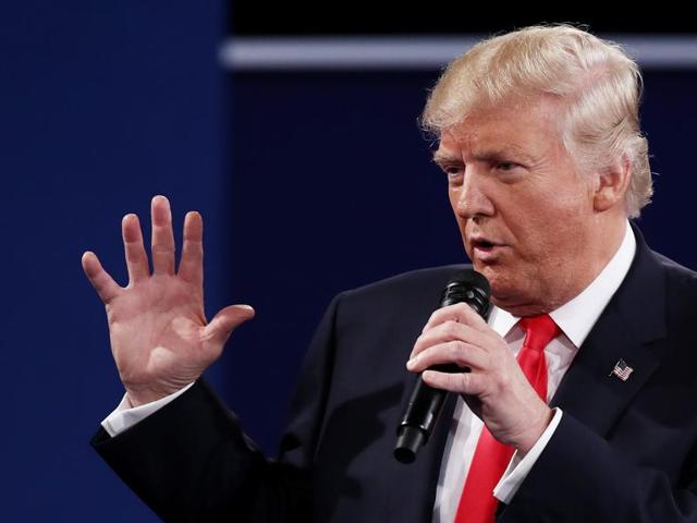 Trump responds to a question during the town hall debate at Washington University. (AFP Photo) Trump responds to a question during the town hall debate at Washington University. (AFP Photo)