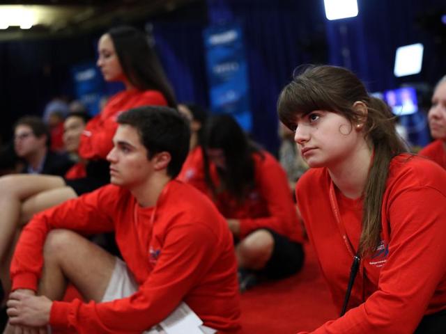Volunteers in the media center watch the second presidential debate with democratic presidential nominee former secretary of state Hillary Clinton and republican presidential nominee Donald Trump at Washington University. (AFP Photo) Volunteers in the media center watch the second presidential debate with democratic presidential nominee former secretary of state Hillary Clinton and republican presidential nominee Donald Trump at Washington University. (AFP Photo)