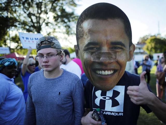 A sign depicting US President Barak Obama is held before the town hall debate at Washington University. (AFP Photo) A sign depicting US President Barak Obama is held before the town hall debate at Washington University. (AFP Photo)
