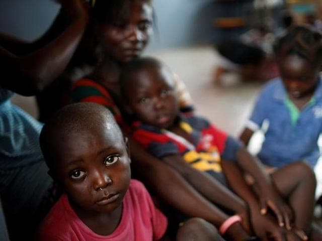 Children sit at a shelter after Hurricane Matthew passes in Jeremie, Haiti, on Sunday. (Reuters) Children sit at a shelter after Hurricane Matthew passes in Jeremie, Haiti, on Sunday. (Reuters)
