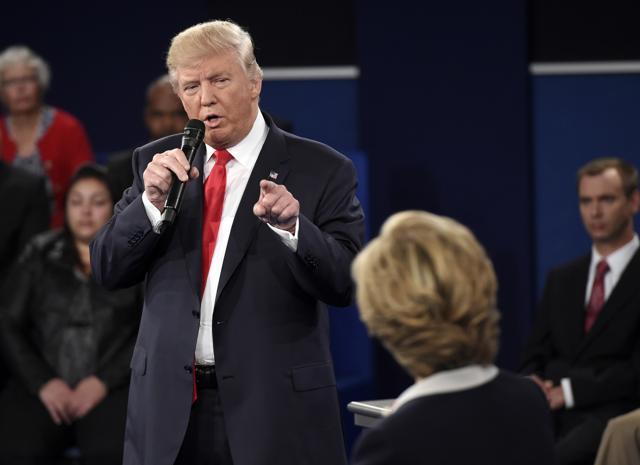 Republican presidential nominee Donald Trump points at Democratic presidential nominee Hillary Clinton as he speaks during the second presidential debate at Washington University in St. Louis. (AP) Republican presidential nominee Donald Trump points at Democratic presidential nominee Hillary Clinton as he speaks during the second presidential debate at Washington University in St. Louis. (AP)