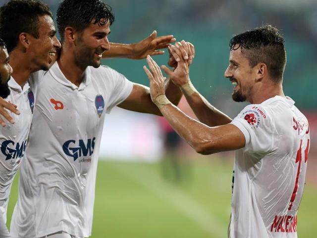Northeast United FC's forward Emiliano Alfaro celebrates after scoring his second goal. (AFP Photo) Northeast United FC's forward Emiliano Alfaro celebrates after scoring his second goal. (AFP Photo)