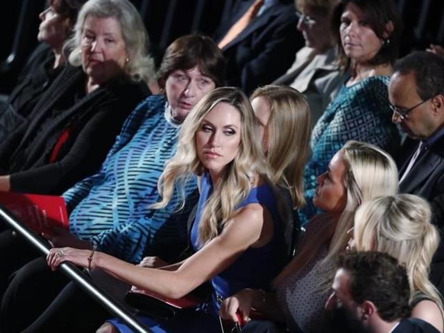Donald Trump's daughters-in-law Lara Trump (centre), is seen seated at the start of the second US presidential town hall debate. (Reuters Photo) Donald Trump's daughters-in-law Lara Trump (centre), is seen seated at the start of the second US presidential town hall debate. (Reuters Photo)