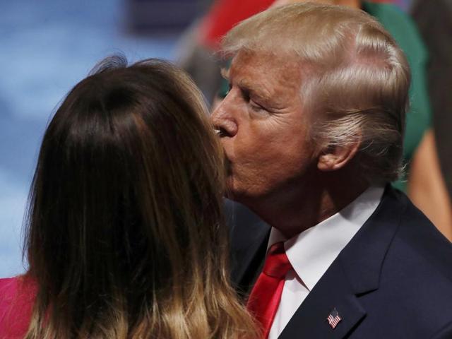 Donald Trump kisses his wife Melania at the end of his debate. (Reuters Photo) Donald Trump kisses his wife Melania at the end of his debate. (Reuters Photo)