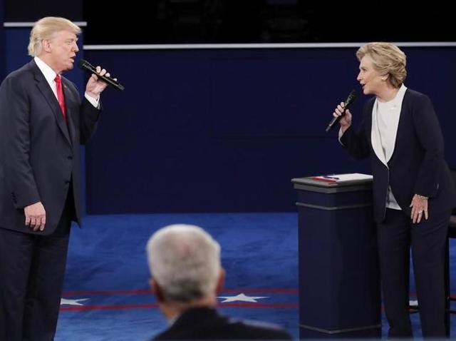 Republican US presidential nominee Donald Trump and Democratic nominee Hillary Clinton speak during their presidential town hall debate at Washington University in St. Louis, Missouri. (Reuters) Republican US presidential nominee Donald Trump and Democratic nominee Hillary Clinton speak during their presidential town hall debate at Washington University in St. Louis, Missouri. (Reuters)