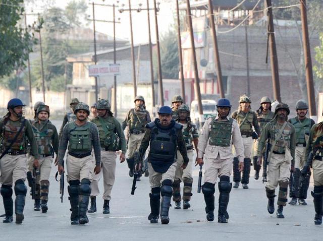 Security personnel during a patrol a street in Srinagar following protests over the death of a 11-year-old boy due to pellet injuries. (PTI) Security personnel during a patrol a street in Srinagar following protests over the death of a 11-year-old boy due to pellet injuries. (PTI)
