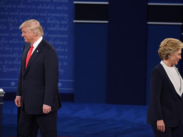 US Democratic presidential candidate Hillary Clinton (R) and US Republican presidential candidate Donald Trump arrive for the second presidential debate at Washington University in St. Louis, Missouri. (AFP Photo) US Democratic presidential candidate Hillary Clinton (R) and US Republican presidential candidate Donald Trump arrive for the second presidential debate at Washington University in St. Louis, Missouri. (AFP Photo)