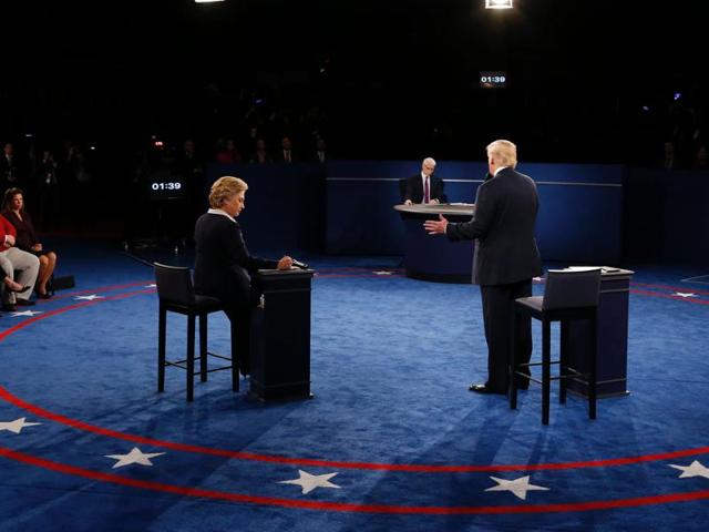 Donald Trump speaks as US Democratic presidential candidate Hillary Clinton (left) listens during the second presidential debate at Washington University. (AFP Photo) Donald Trump speaks as US Democratic presidential candidate Hillary Clinton (left) listens during the second presidential debate at Washington University. (AFP Photo)