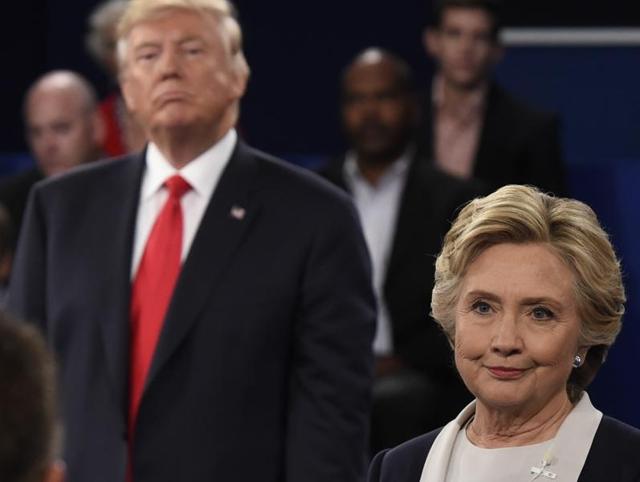 US presidential nominees Democrat Hillary Clinton (right) and Republican Donald Trump during their town hall debate at Washington University in St. Louis, Missouri, on October 9, 2016. (AFP) US presidential nominees Democrat Hillary Clinton (right) and Republican Donald Trump during their town hall debate at Washington University in St. Louis, Missouri, on October 9, 2016. (AFP)