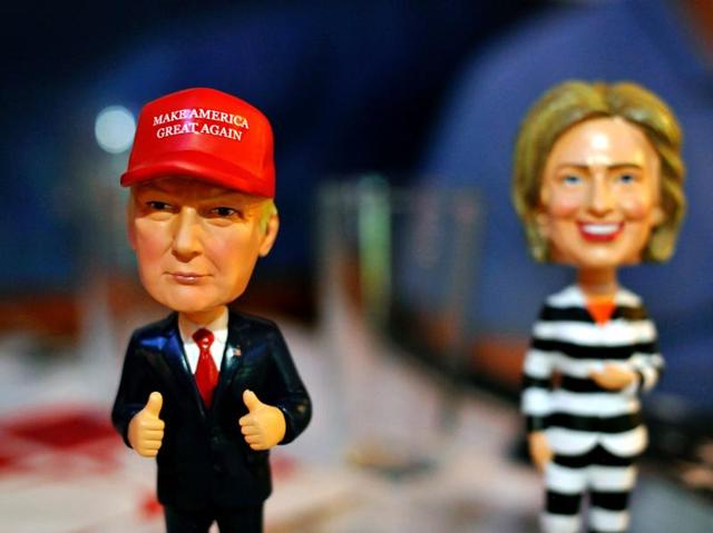 Bobble head figurines of Republican presidential nominee Donald Trump and Democratic presidential nominee Hillary Clinton. (AFP Photo) Bobble head figurines of Republican presidential nominee Donald Trump and Democratic presidential nominee Hillary Clinton. (AFP Photo)