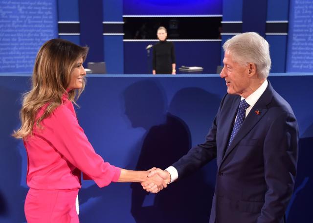 Former US president Bill Clinton greets Melania Trump, wife of Republican presidential candidate Donald Trump, before the start of the second presidential debate at Washington University. (AFP Photo) Former US president Bill Clinton greets Melania Trump, wife of Republican presidential candidate Donald Trump, before the start of the second presidential debate at Washington University. (AFP Photo)