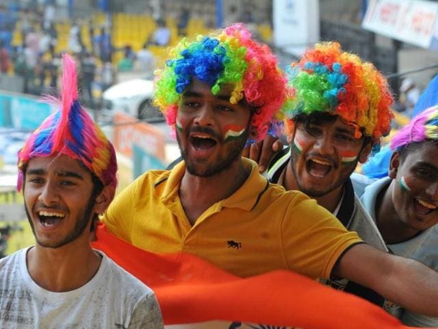 A cricket fan dressed up as Ravana enjoys the third day of India-New Zealand test match at Holkar stadium in Indore on Monday.(Shankar Mourya/HT Photo)