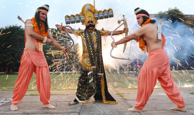 Artists dressed as Rama, Lakshmana and Ravnana during Dusshera celebration at sector 17 in Chandigarh on Tuesday . (Anil Dayal/HT) Artists dressed as Rama, Lakshmana and Ravnana during Dusshera celebration at sector 17 in Chandigarh on Tuesday . (Anil Dayal/HT)
