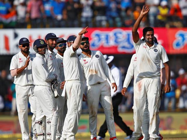 India’s players celebrate the wicket of New Zealand’s Jeetan Patel. (REUTERS) India’s players celebrate the wicket of New Zealand’s Jeetan Patel. (REUTERS)