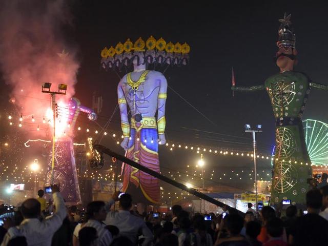 Devotees celebrating the Dussehra festival at Lovkush Ram Lila Committee at Red fort in New Delhi. (Sonu Mehta/HT Photo) Devotees celebrating the Dussehra festival at Lovkush Ram Lila Committee at Red fort in New Delhi. (Sonu Mehta/HT Photo)
