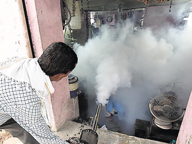 Corporation workers fumigate houses in east Delhi.(Arun Sharma/HT FILE) Corporation workers fumigate houses in east Delhi.(Arun Sharma/HT FILE)