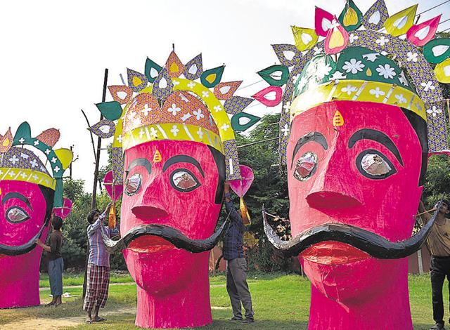 Artisans and craftsmen have spent nearly a month to make the effigies of Ravan which will be set afire on the festival of Dussehra on Tuesday. (Sakib Ali/HT Photo) Artisans and craftsmen have spent nearly a month to make the effigies of Ravan which will be set afire on the festival of Dussehra on Tuesday. (Sakib Ali/HT Photo)