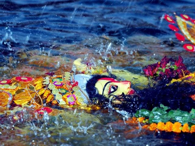The immersion of Goddess Durga in progress on Vijaydashmi at Line Tank Pond in Ranchi. (HT Photo)