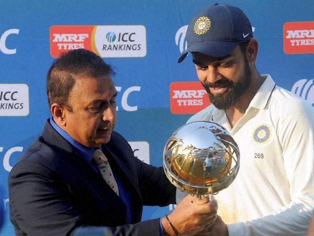 India captain Virat Kohli is presented the Test Championship mace by former Sunil Gavaskar. (PTI) India captain Virat Kohli is presented the Test Championship mace by former Sunil Gavaskar. (PTI)