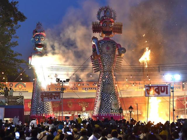 Effigies of Raavan, Kumbhkaran and Meghnath being set on fire during the Dusshera celebrations at Shri Dharmic Leela Committee in Old Delhi on Tuesday. (Ajay Aggarwal/HT Photo) Effigies of Raavan, Kumbhkaran and Meghnath being set on fire during the Dusshera celebrations at Shri Dharmic Leela Committee in Old Delhi on Tuesday. (Ajay Aggarwal/HT Photo)