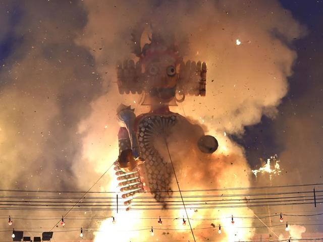Effigies of demon Raavan, Kumbhkaran and Meghnath being set on fire during the Dusshera celebrations at Shri Dharmic Leela Committee in Old Delhi on Tuesday. (Ajay Aggarwal/HT Photo) Effigies of demon Raavan, Kumbhkaran and Meghnath being set on fire during the Dusshera celebrations at Shri Dharmic Leela Committee in Old Delhi on Tuesday. (Ajay Aggarwal/HT Photo)