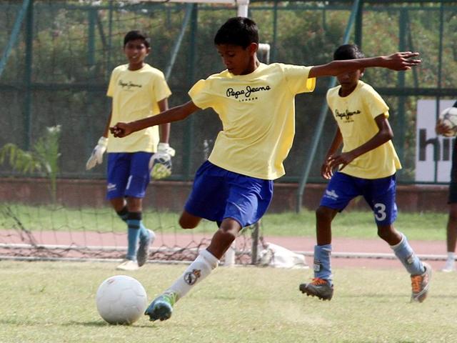 Children from the underprivileged sections of the society took part in the match.(Photo: Waseem Gashroo/HT)