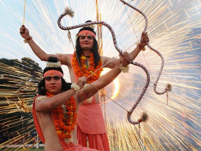 Artists dressed as Rama and Lakshmana during Dusshera celebration at sector 17 in Chandigarh on Tuesday . (Anil Dayal/HT Photo) Artists dressed as Rama and Lakshmana during Dusshera celebration at sector 17 in Chandigarh on Tuesday . (Anil Dayal/HT Photo)
