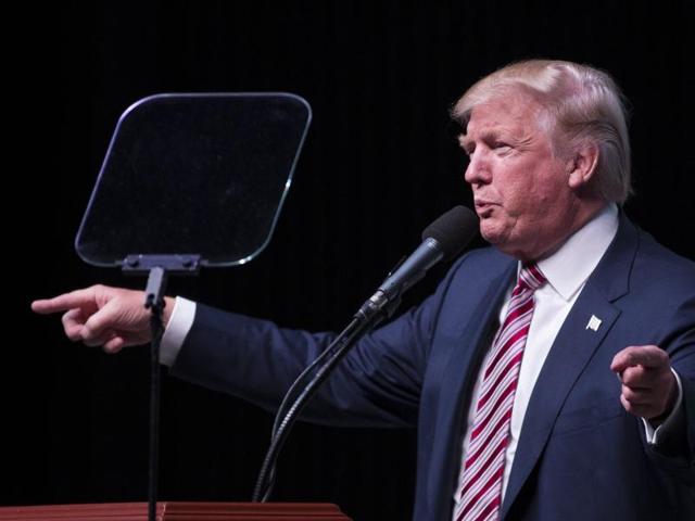 Exactly four weeks before Election Day and with his campaign floundering, Donald Trump has reverted to the combative, divisive strategy that propelled him to victory in the GOP primary: Attack every critic. (AFP)