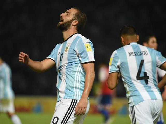Argentina's players leave the field dejected after their loss to Paraguay. (AFP) Argentina's players leave the field dejected after their loss to Paraguay. (AFP)