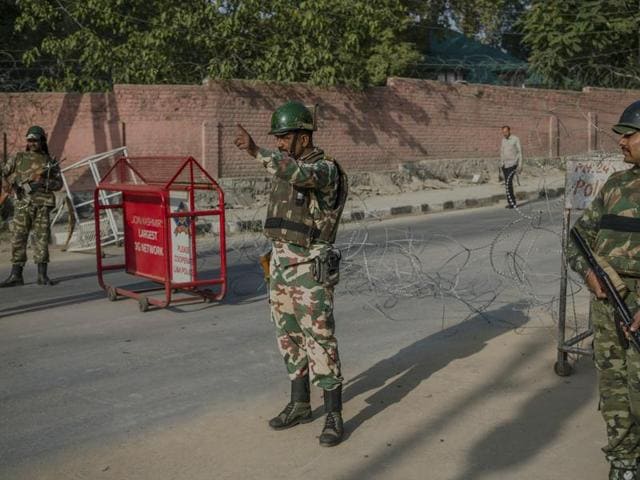 A soldier at a temporary checkpoint during curfew in Srinagar. (AP File Photo) A soldier at a temporary checkpoint during curfew in Srinagar. (AP File Photo)