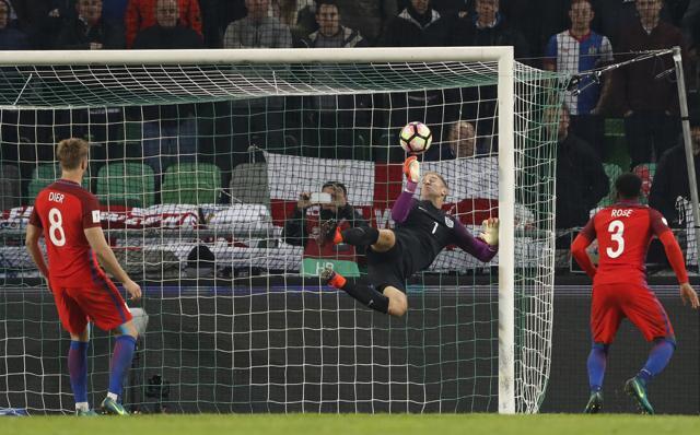 England's Joe Hart makes a save in their 2018 World Cup qualifying match against Slovenia. (Reuters Photo) England's Joe Hart makes a save in their 2018 World Cup qualifying match against Slovenia. (Reuters Photo)