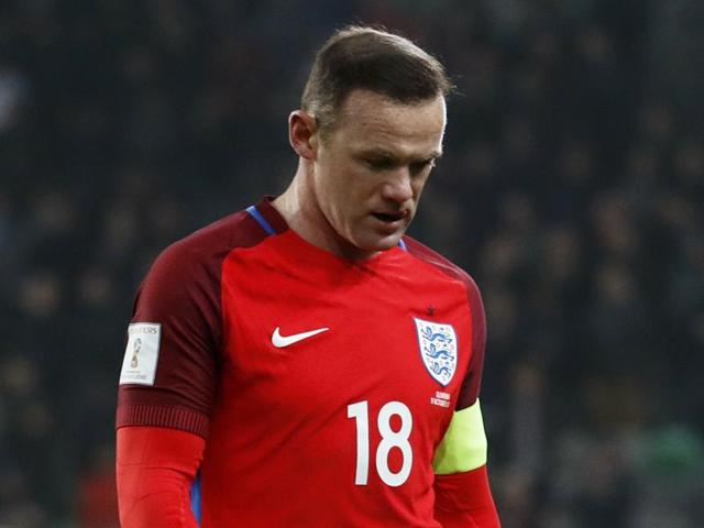 England's Wayne Rooney looks dejected at the end of their match against Slovenia at Stadion Stozice, Ljubljana. (Reuters Photo) England's Wayne Rooney looks dejected at the end of their match against Slovenia at Stadion Stozice, Ljubljana. (Reuters Photo)