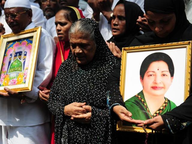 Muslims hold a portrait of Tamil Nadu chief minister J Jayalalithaa as they pray for her well-being near the Apollo hospital where she is being treated in Chennai. (AFP file photo) Muslims hold a portrait of Tamil Nadu chief minister J Jayalalithaa as they pray for her well-being near the Apollo hospital where she is being treated in Chennai. (AFP file photo)