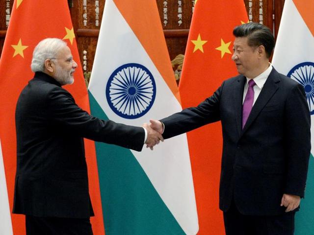 Prime Minister Narendra Modi (left) shakes hands with Chinese President Xi Jinping at the West Lake State Guest House ahead of the G20 Summit in Hangzhou, Zhejiang province, China. (Reuters File Photo) Prime Minister Narendra Modi (left) shakes hands with Chinese President Xi Jinping at the West Lake State Guest House ahead of the G20 Summit in Hangzhou, Zhejiang province, China. (Reuters File Photo)