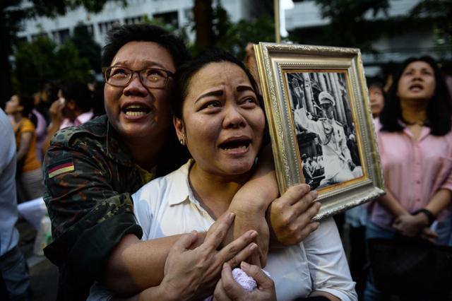People mourn the death of King Bhumibol. (AFP)