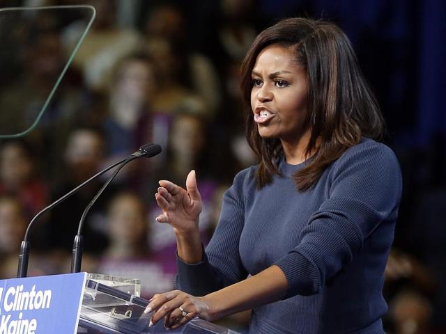 First lady Michelle Obama speaks during a campaign rally for Democratic presidential candidate Hillary Clinton in Manchester. (AP Photo) First lady Michelle Obama speaks during a campaign rally for Democratic presidential candidate Hillary Clinton in Manchester. (AP Photo)