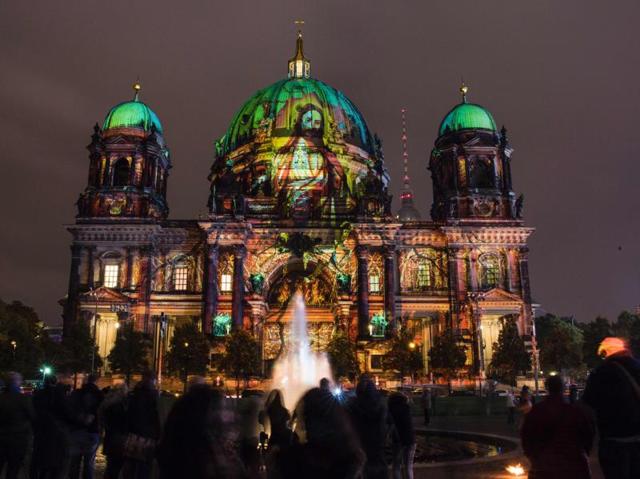 For nearly two weeks, famous buildings and monuments like Brandenburg Gate, Fernsehturm, Berlin Cathedral, Berlin Victory Column etc become canvasses of illumination and light art. Religious imagery is projected on the facade of the Berlin Cathedral (Berliner Dom). (AFP) 