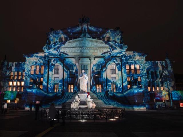 Special tours by bus, bicycle, taxi and boat are convenient ways to experience as many of the illuminated buildings as possible. Colourful designs are projected on the facade of the Berlin Concert Hall (Konzerthaus). (AFP) 