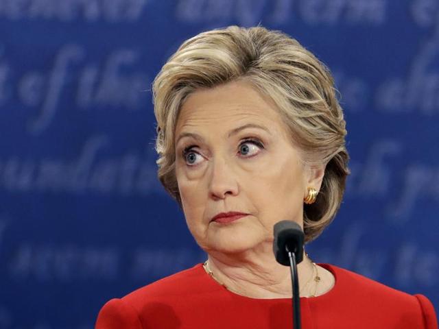 In this September 26, 2016 file photo, Democratic presidential nominee Hillary Clinton listens to Republican presidential nominee Donald Trump during the US presidential debate at Hofstra University.(AP) In this September 26, 2016 file photo, Democratic presidential nominee Hillary Clinton listens to Republican presidential nominee Donald Trump during the US presidential debate at Hofstra University.(AP)