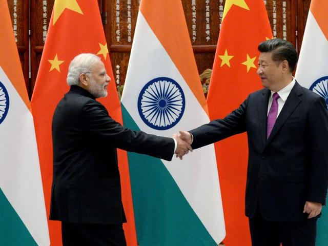 PM Narendra Modi (L) shakes hands with Chinese President Xi Jinping at the West Lake State Guest House ahead of G20 Summit in Hangzhou, Zhejiang province, China, September 4, 2016. REUTERS/Wang Zhao/Pool - RTX2O0Y9(REUTERS)