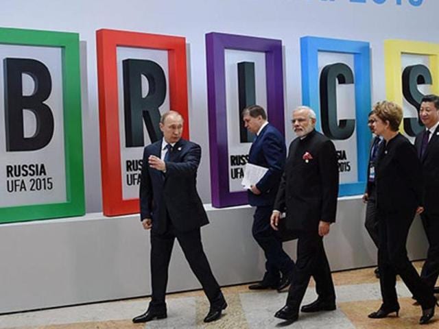 Prime Minister Narendra Modi with Russian President Vladimir Putin, Brazilian President Dilma Rousseff, Chinese President Xi Jinping and South African President Jacob Zuma after the welcome ceremony at the 7th BRICS Summit in Ufa. (PTI File Photo) Prime Minister Narendra Modi with Russian President Vladimir Putin, Brazilian President Dilma Rousseff, Chinese President Xi Jinping and South African President Jacob Zuma after the welcome ceremony at the 7th BRICS Summit in Ufa. (PTI File Photo)
