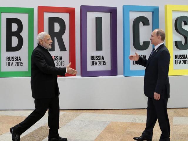 In this file photo, Prime Minister Narendra Modi and Russian President Vladimir Putin prepare to shake hands prior to their talks during the BRICS Summit in Ufa, Russia.(AP File Photo)